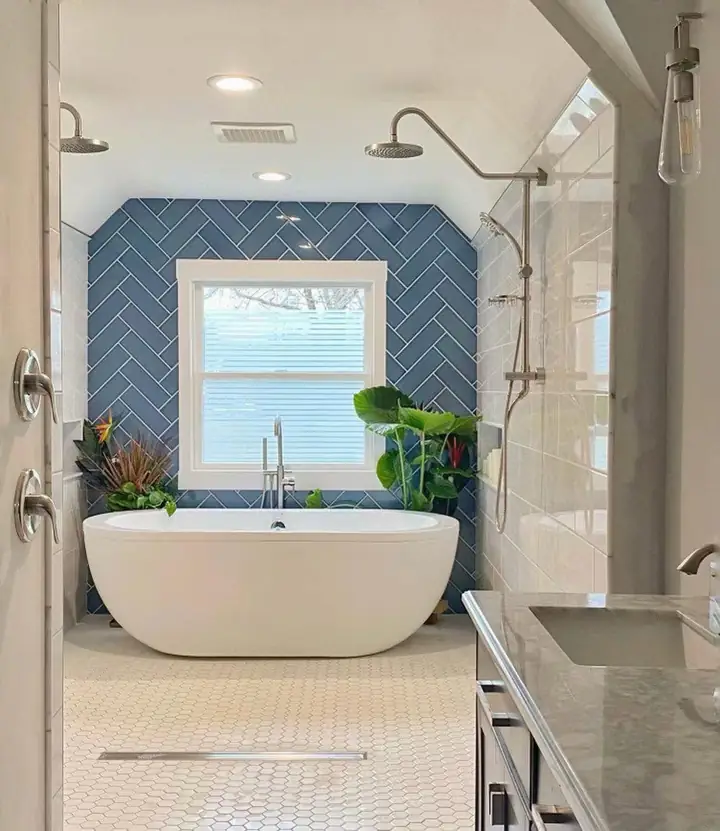 Finished bathroom renovation with coordinated vanity and tile